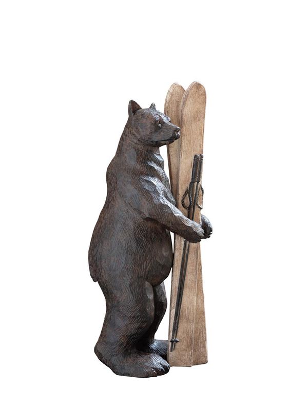 Bjørn med ski og staver